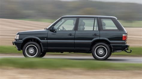 Range Rover P38 su sumontuotais originaliais R16 ratlankiais