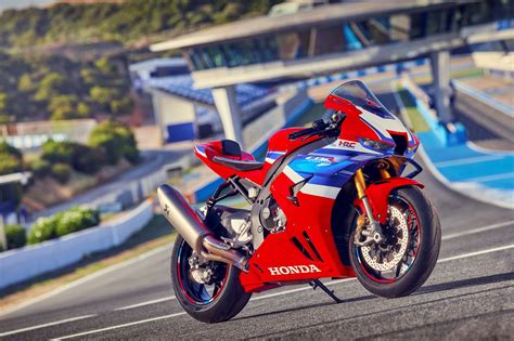 Honda CBR1000RR Fireblade 2008-2010 model on a scenic road, side view