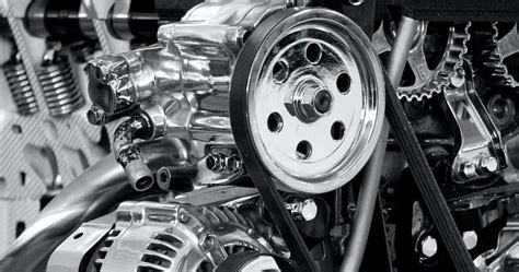 Mechanikas keičiantis variklio diržą
