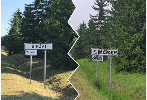 biržų rajono kelio ženklas ir policijos automobilis