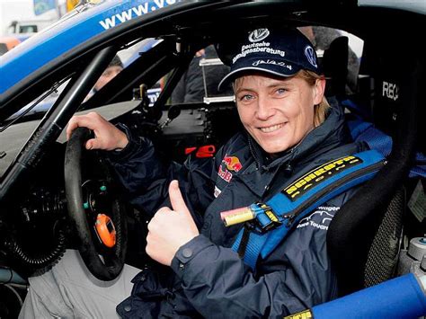Jutta Kleinschmidt su lenktyniniu automobiliu