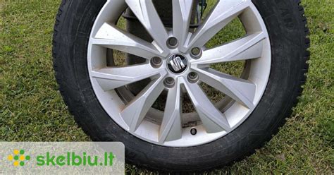 Volkswagen Tiguan su R17 ratlankiais (šoninis vaizdas)