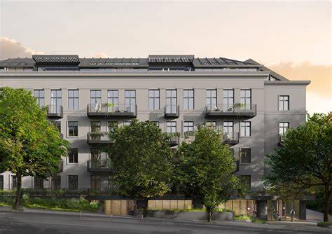 Teminė nuotrauka, vaizduojanti istorinį verslo pastatą su tvirtais pamatais ir šiuolaikiniu priestatu