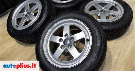Audi A4 automobilis su R16 lietų ratlankių komplektu, išryškinantis jų estetiką