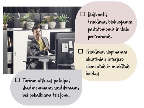 Teminė nuotrauka: besišypsanti darbuotoja, konsultuojama malonaus VDI specialisto biure