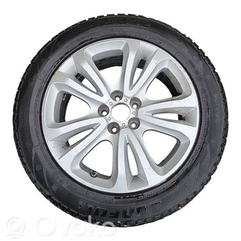 Citroen C5 ratlankis su centriniu dangteliu ir logotipu