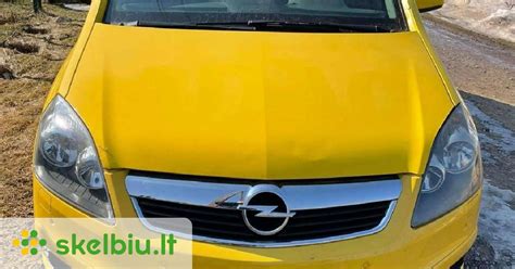Opel Zafira variklio skyriaus nuotrauka su pažymėtomis galimomis problemų vietomis (pvz., tepalo nutekėjimo zonos)