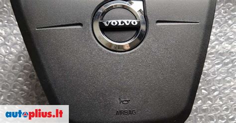 Volvo XC60 vairo kairiojo perjungiklio nuotrauka su OK ir RESET mygtukais bei reguliavimo ratuku