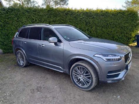 Teminė Volvo XC90 nuotrauka su skandinavišku kraštovaizdžiu