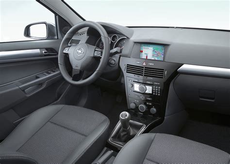 Interior of an Opel Astra H, highlighting the dashboard and seats