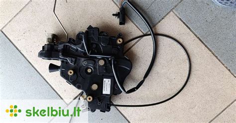 VW Golf 5 bagažinės spynos mechanizmo schema
