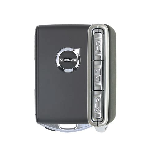 Diagram showing how to slide the front cover of the Volvo key fob
