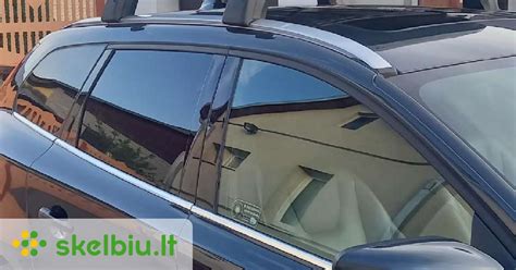 Volvo XC60 su ATERA stogo skersiniais, teminė nuotrauka