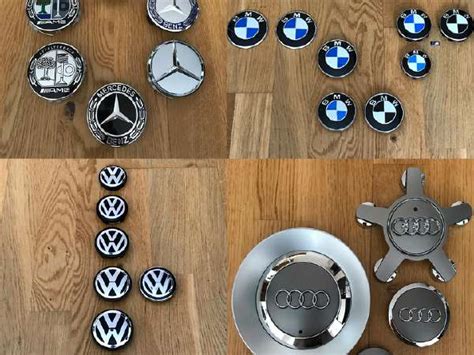 Įvairių automobilių markių ratlankių dangteliai ir centrinės emblemos