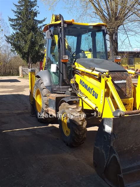 Komatsu WB93 ekskavatoriaus-krautuvo teminė nuotrauka