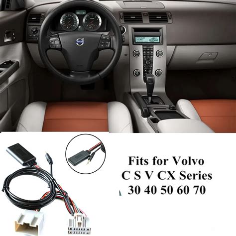 Nuotrauka, iliustruojanti reikalingas dalis ir įrankius AUX jungties montavimui Volvo V50