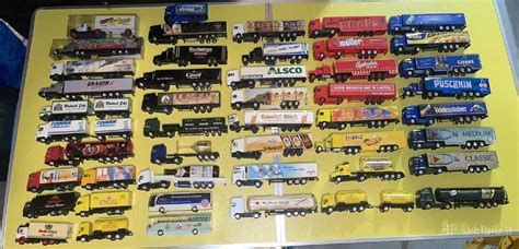 Ilustracija su įvairių tipų „Tauro” priekabomis