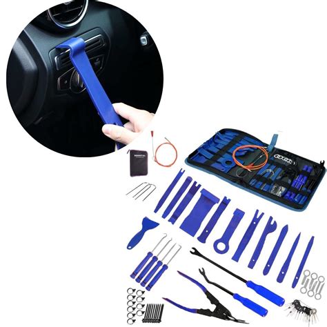 Nuotrauka, iliustruojanti įvairius automobilių remonto įrankius ir įrangą