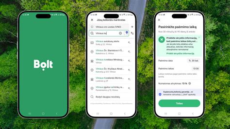 Vairuotojas su išmaniajame telefone rodoma „Bolt“ programėle