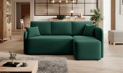 Thematic photo of a modern green soft corner sofa with a sleeping function and storage
