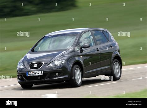 Thematic photo of Seat Altea driving on a road