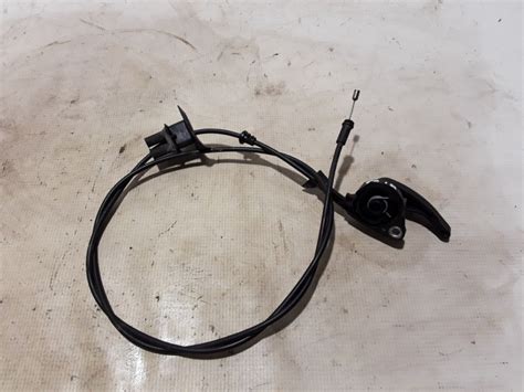 Variklio gaubto fiksatoriaus mechanizmas su troso jungtimi Renault Scenic