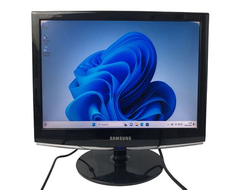 The Samsung SyncMaster 305T monitor showcasing its large screen and thin bezel