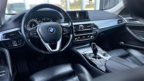 BMW 5 serijos E61 interjeras su iDrive sistema