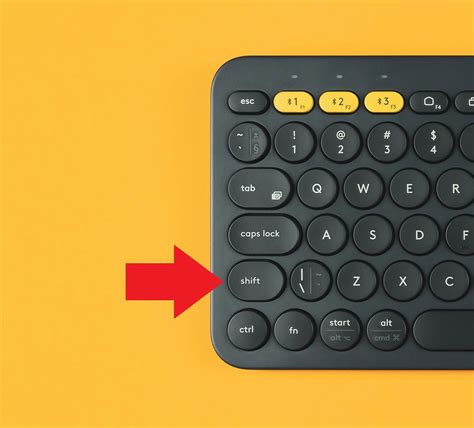schema: „Shift Lock“ atblokavimo mygtuko vieta ir naudojimas