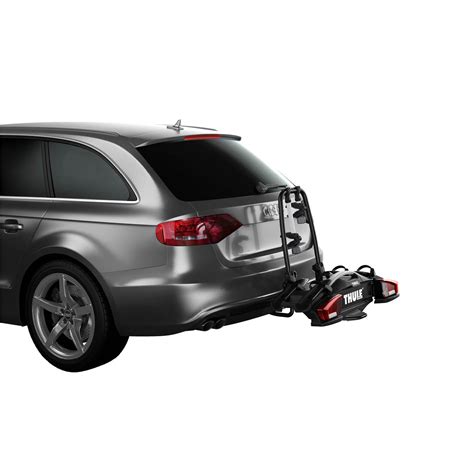 Dviračių laikiklis ant automobilio kablio su keliais dviračiais