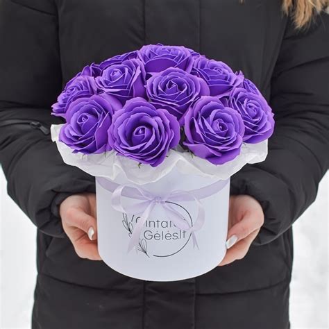 detali nuotrauka, vaizduojanti violetines nuosėdas LHM bakelyje