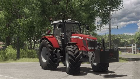 Nuotrauka, vaizduojanti sudėtingą Massey Ferguson traktoriaus pavarų dėžės sistemą, kurioje matoma sankabos vieta.