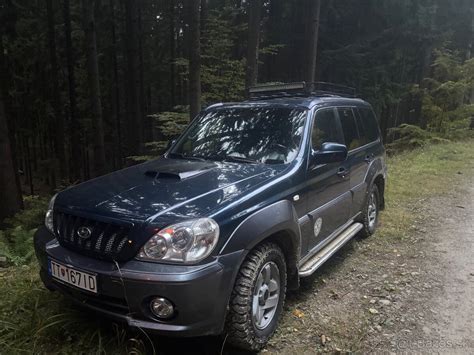 Infografika su pagrindiniais Hyundai Terracan 2.9 CRDi Middle parametrais: galia, sukimo momentas, kuro sąnaudos.