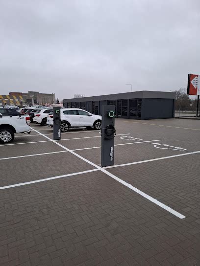 nuotrauka su negaliems pritaikyta automobiliu aikstele