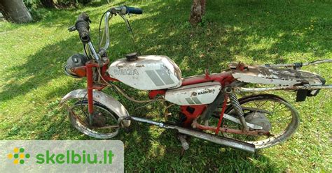 Tematinė nuotrauka su „Delta“ mopedo varikliu ar jo komponentais