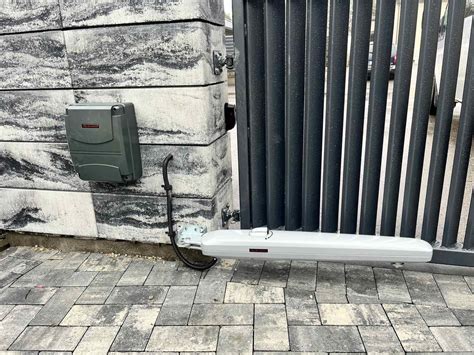 Teminis atveriamų vartų automatikos įrenginys