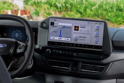 Interior of the Ford Transit Custom, showing the 13-inch SYNC 4 touchscreen with navigation.