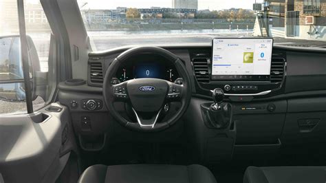 Detailed view of the Ford Transit Custom's dashboard and interior features.