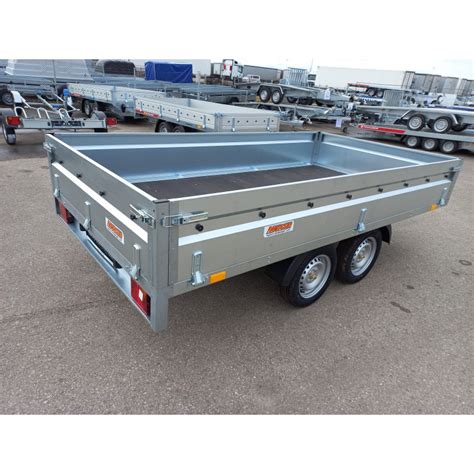 Dviašė priekaba su šoniniais ratais, tinkama sunkiems kroviniams