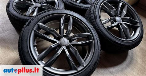 Audi A6 (C5) su didelėmis padangomis, rodančiomis ratų arkas