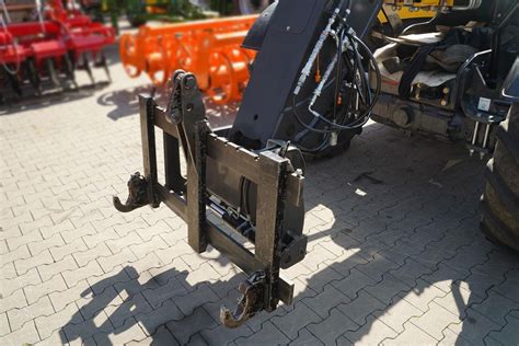 Schema, iliustruojanti teleskopinio krautuvo veikimo principą ir įvairius priedus