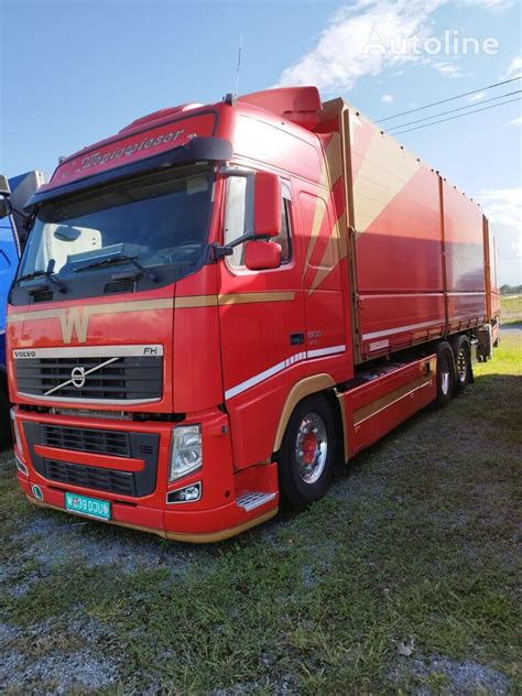 Tematinė nuotrauka: sunkvežimis su priekaba kroviniui vežti