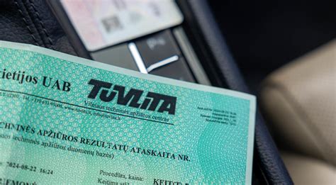 Vokiškos techninės apžiūros lapai su nurodyta rida