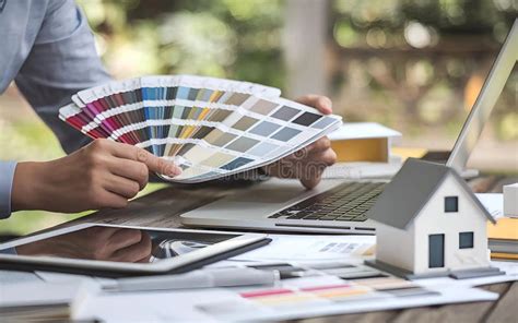 Thematic photo of a person choosing paint colors with a palette or app