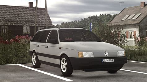 Volkswagen Passat B3 automobilis važiuojantis naktį su įjungtais žibintais