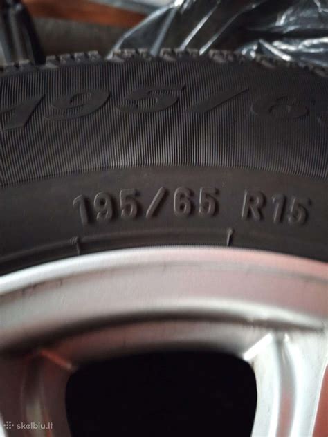Pavyzdys, kaip perskaityti padangos žymėjimą (pvz., 195/65 R15)