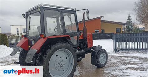MTZ traktorius su prikabintu padargu, jungiamu per darbinį veleną