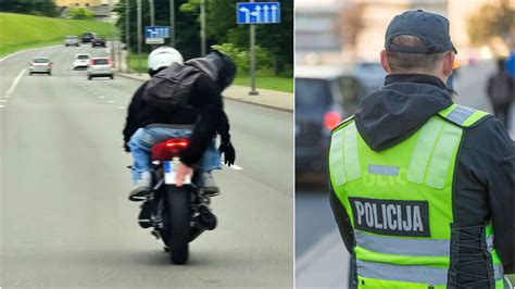 Mopedo ir motociklo vairuotojo su šalmu ir apsaugomis nuotrauka