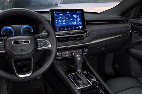 Interior of the new Jeep Compass showcasing the dual screens and Uconnect 5 system