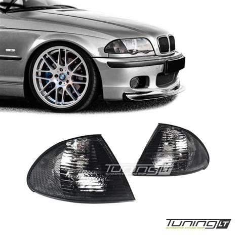 Artinamas vaizdas į pažeistą BMW E46 posūkių ir šviesų jungiklį, demonstruojantį nusidėvėjimo požymius